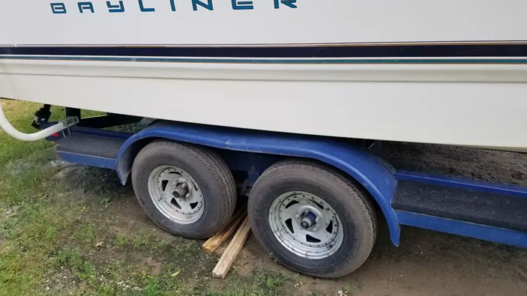 image of author's tandem-axle trailer for his cuddy cabin boat.