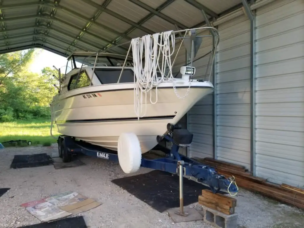 image of author's cuddy cabin boat on a trailer for towing.