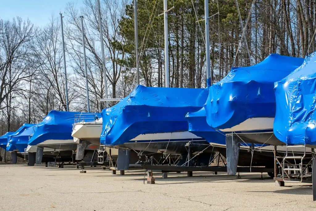 image of boats that are shrink wrapped for the winter season