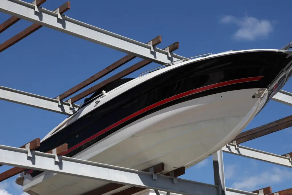 image of a boat being stored on a dry rack during the off season