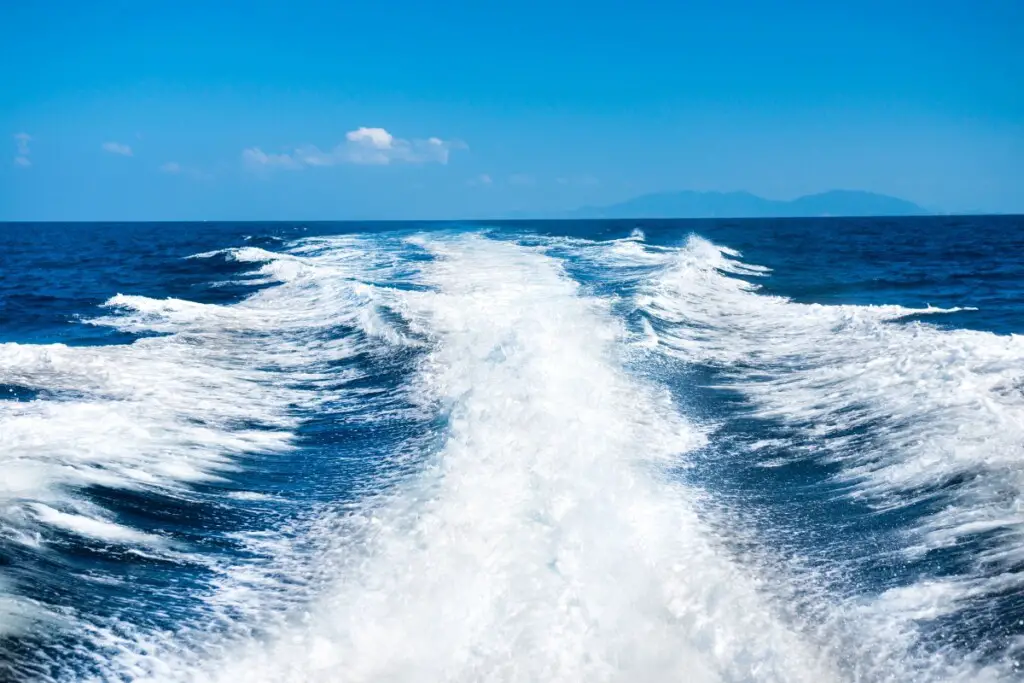 image showing the wake behind a boat that is trimmed properly and on plane