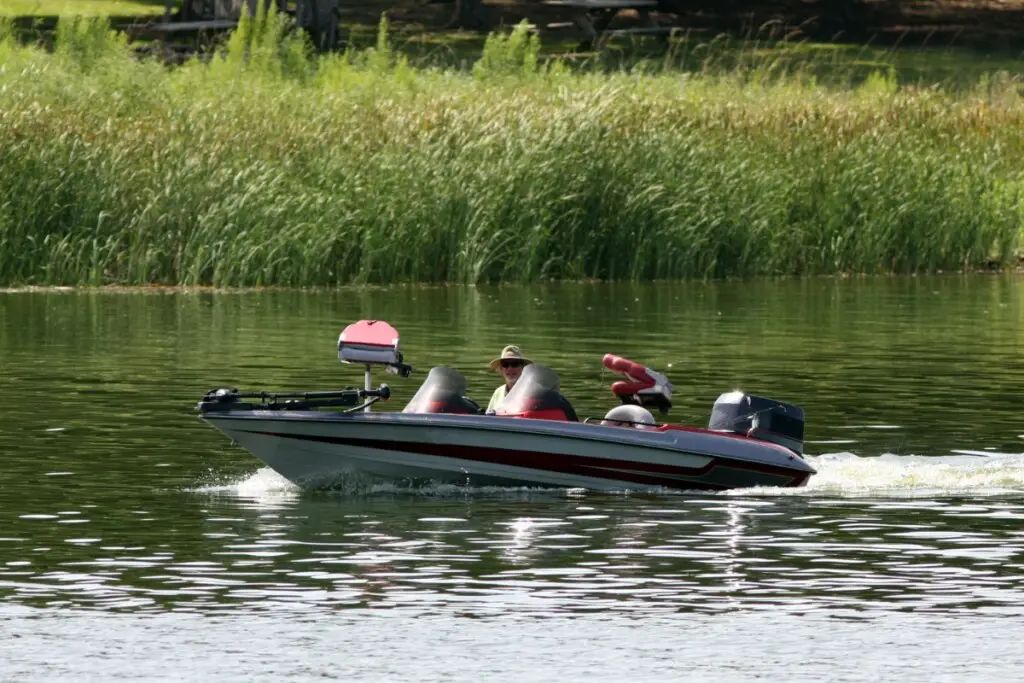 image of a bass boat cruising in a lake