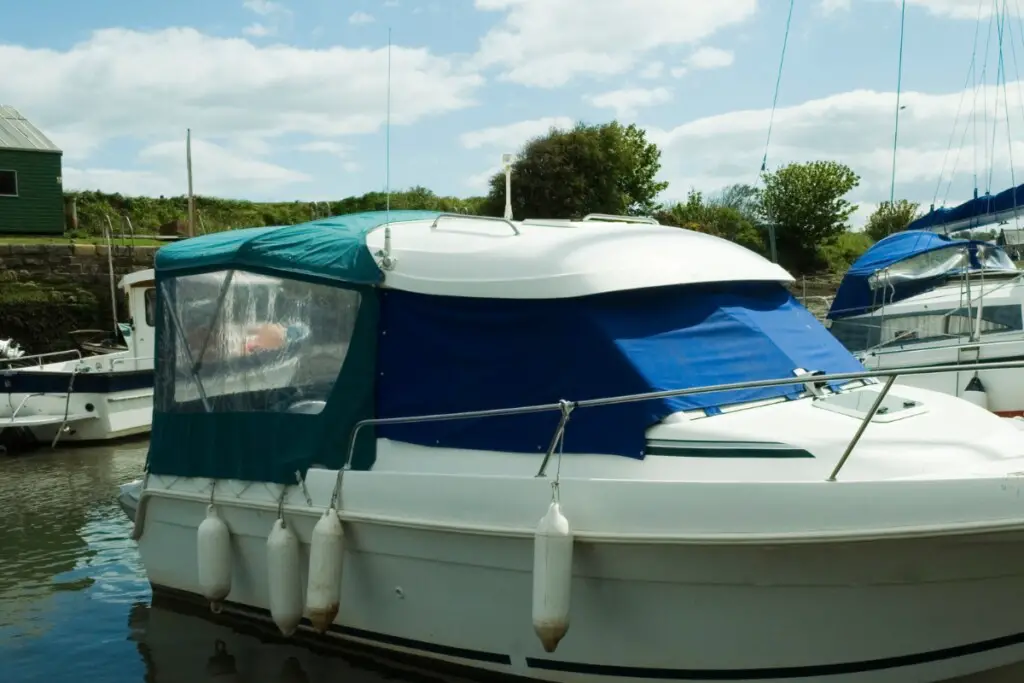 image showing bimini on a small cuddy while docked