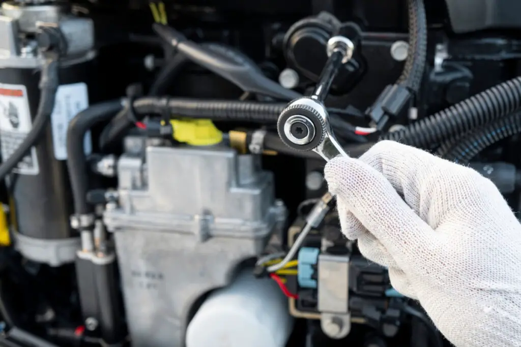 image showing routine maintenance on a boat engine